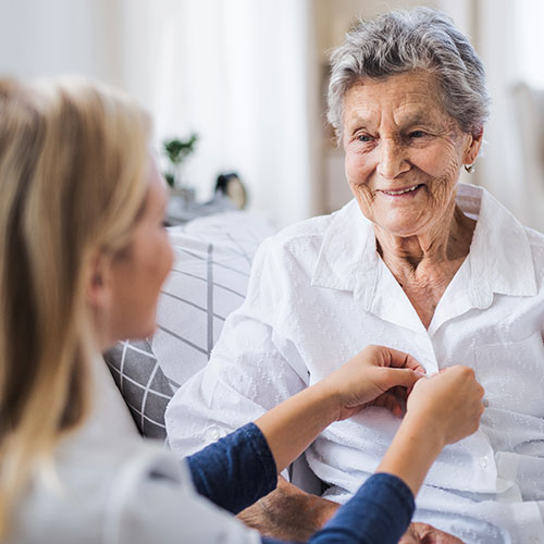 assistant nurse assisting with daily personal care needs – helping client to get dressed, personal care, assistance with personal needs, personal care assistance, 24/7 Nursing & Medical Services