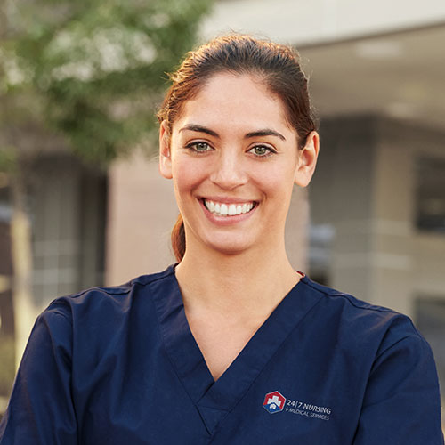 Overseas nurse in front of hospital, Overseas nurses working in Australia, Nursing placement in Australia, 24/7 Nursing & Medical Services