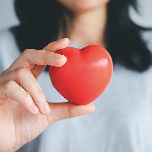 nurse holding a heart shape, 24/7 nursing & medical services, our values